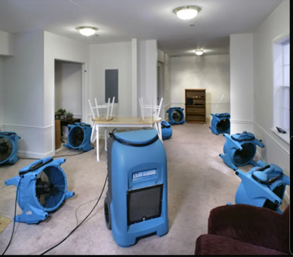 Air movers and dehumidifier setup for Water Damage Restoration in Saddlebrooke
